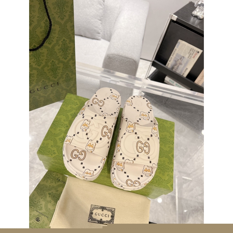 G*u*i slippers